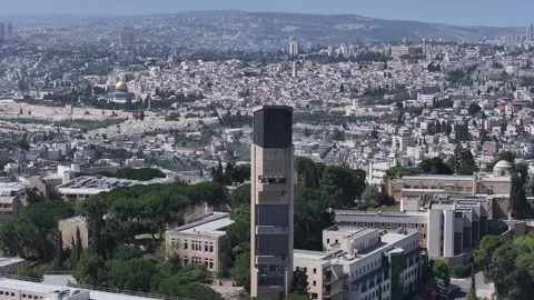 Aerial view of Hebrew University Mount Scopus tower and Jerusalem city line Stock Footage 341507446