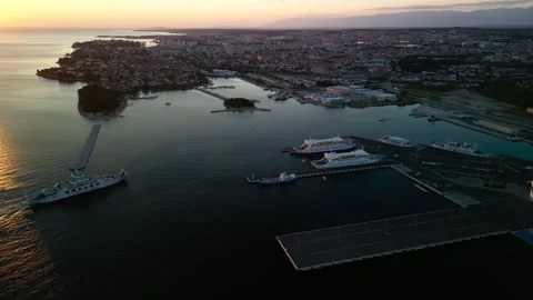 Aerial View of Hel Peninsula Harbor at Sunset with Ferries Docked, Poland Stock Footage 341520216