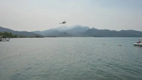 Aerial View of Helicopter Engaged in Wildfire Control Stock Footage 282928123