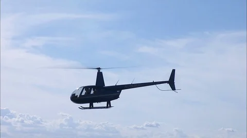 Aerial view helicopter with pilot flying United States Stock-Footage 80170376