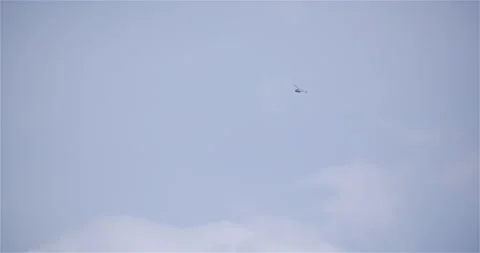 Aerial View of Helicopter Under Blue Sky Stock Footage 308260002