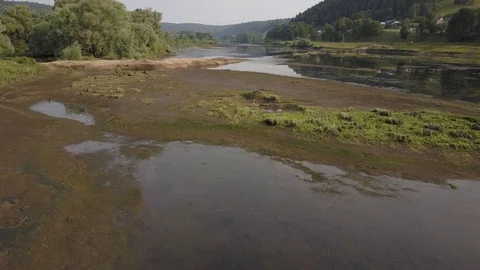 Aerial view of Heron on the river shallow 4k Stock Footage 78496790