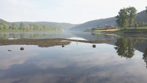 Aerial view of Heron on the river shallow 4k Stock Footage 78500481