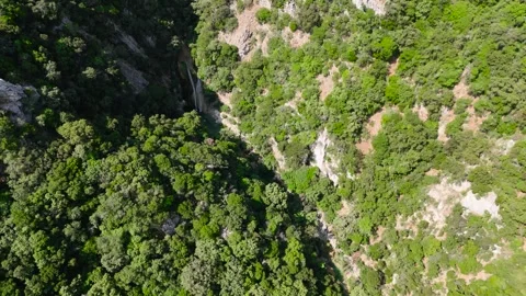 Aerial View of Hidden Waterfall in Polylimnio Canyon Stock-Footage 334898944