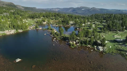 Aerial view of a high alpine mountain lake in the Beartooth Mountains Stock Footage 267127972