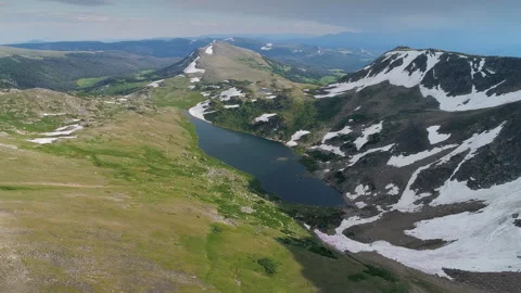 Aerial view of a high alpine mountain lake in the Beartooth Mountains Stock Footage 267128345