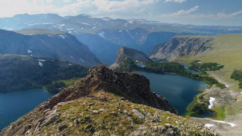 Aerial view of a high alpine mountain lake in the Beartooth Mountains Stock Footage 267129579
