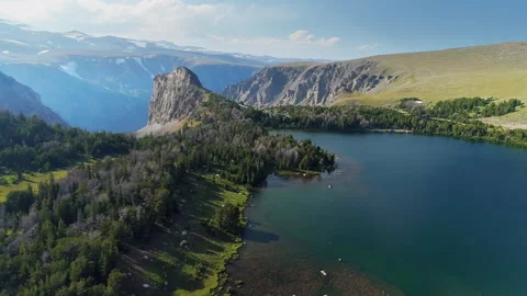 Aerial view of a high alpine mountain lake in the Beartooth Mountains Stock Footage 267129736