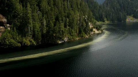 Aerial view high altitude fresh water lake Rockies, Canada Stock Footage