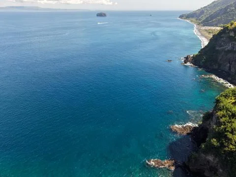 Aerial View of High Cliffs and Turquoise Ocean at Bukit Asah Bali Stock Photos