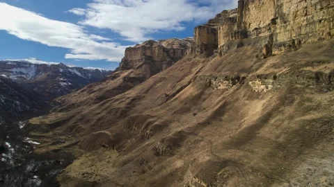 Aerial view of high cliffs in the mountain gorge of the Caucasus. Stock Footage 178655850