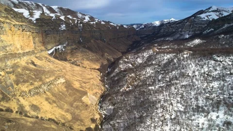 Aerial view of high cliffs in the mountain gorge of the Caucasus. Stock Footage 178655938