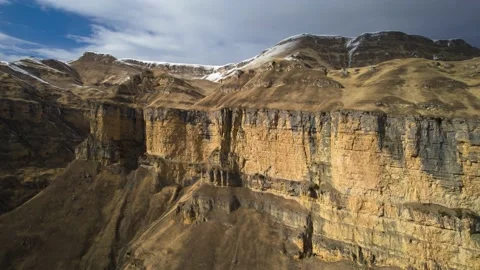 Aerial view of high cliffs in the mountain gorge of the Caucasus. Stock Footage 178656447