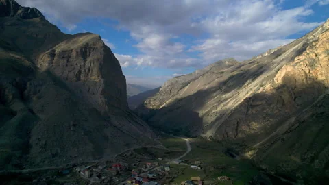 Aerial view of high cliffs in a mountain gorge. Stock Footage 319447109