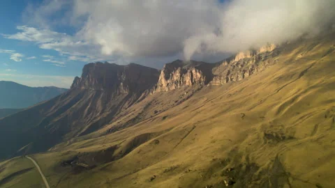 Aerial view of high cliffs in a mountain gorge. Stock Footage 319447112