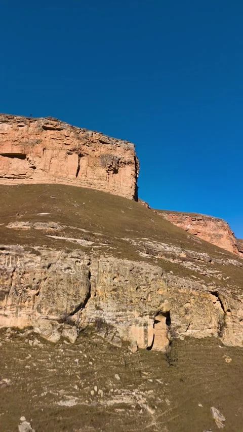 Aerial view of high cliffs in a mountain gorge. Stock Footage 325303499