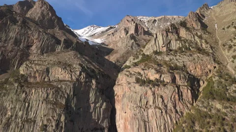 Aerial view of high cliffs in a mountain gorge. Stock Footage 332919825