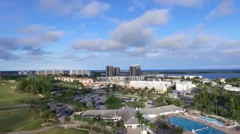 Aerial view from high to low of the North Palm Beach Golf Resort Video stock 62471396
