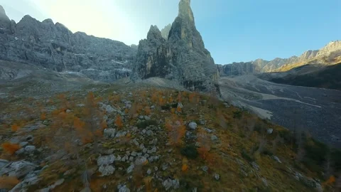 Aerial view of high mountain range in Dolomites, Italy. Filmed by FPV drone Stock Footage 295292240