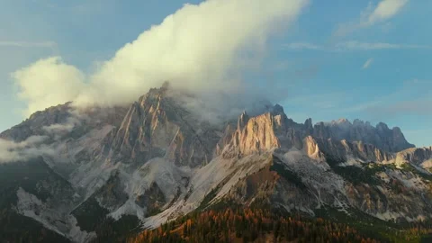 Aerial view of high mountain range with clouds in Dolomites, Italy Stock Footage 295294948