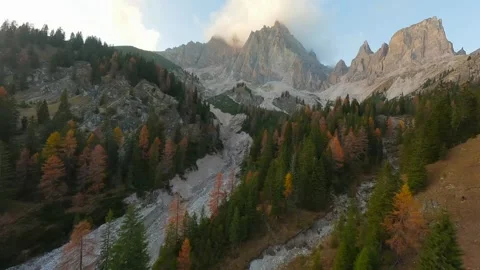 Aerial view of high mountain range with clouds in Dolomites, Italy Stock Footage 295295864