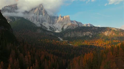 Aerial view of high mountain range with clouds in Dolomites, Italy Stock Footage 301536112