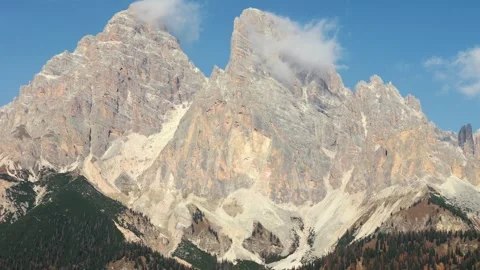 Aerial view of high mountain range with clouds in Dolomites, Italy Video stock 326777888