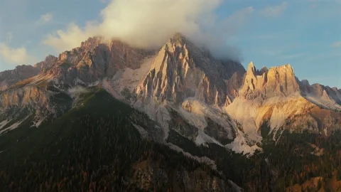 Aerial view of high mountain range covered with clouds in Dolomites, Italy Stock Footage 346911982