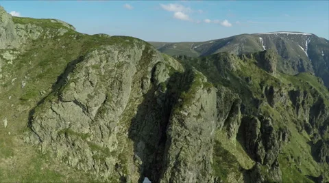 Aerial view of high mountain side, sunset light Stockbeeldmateriaal 68416906
