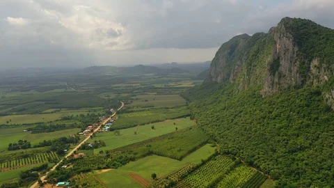 Aerial view. High mountain views and the verdant farmland of the countryside Видео 111906504