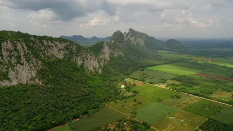 Aerial view. High mountain views and the verdant farmland of the countryside Stock Footage 111906867
