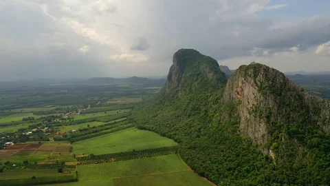 Aerial view. High mountain views and the verdant farmland of the countryside 動画素材 111906917