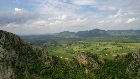 Aerial view. High mountain views and the verdant farmland of the countryside Stock Footage 112994842