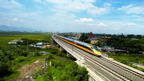 Aerial view of the High speed orange train on the railway station. Video stock 232124018