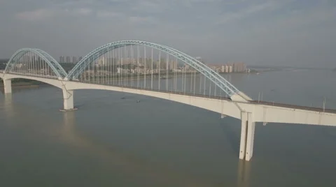 Aerial view of high speed train crossing Yangtze river, China infrastructure Stock Footage