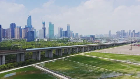 Aerial view of high speed train running through hangzhou qianjiang century new Stock Footage 194620813