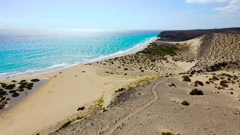 Aerial view of high tide, along the coast of Sotavento Beach. Stock Footage 284288065