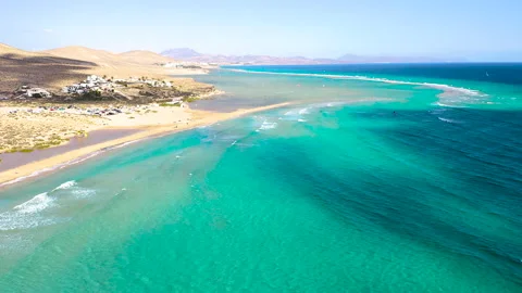 Aerial view of high tide, along the coast of Sotavento Beach. Stock Footage 284288079