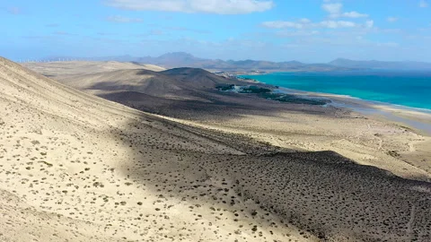 Aerial view of high tide, along the coast of Sotavento Beach. Stock Footage 284386792