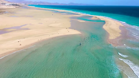 Aerial view of high tide, along the coast of Sotavento Beach. Stock Footage 284386952