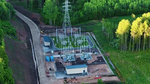 Aerial view of a high-voltage electrical substation under construction Stock Footage 341387968