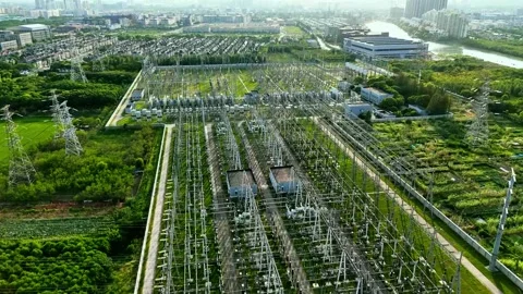 Aerial View of High Voltage Electrical Substation and Power Grid Infrastructure Stock Footage 341596292