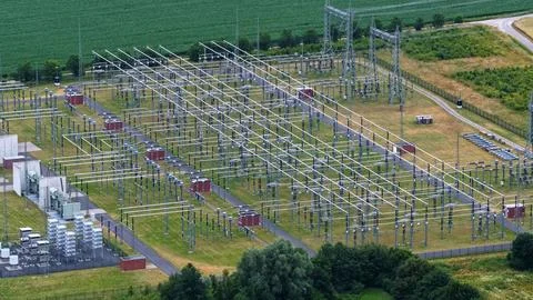 Aerial View of High Voltage Electrical Substation and Power Grid Stock Photos