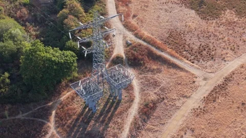 Aerial View of High Voltage Electricity Pylon and Power Lines, England Stock Footage 342293858