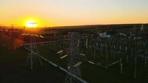 Aerial view of High voltage power lines. Electricity distribution station at Stock Footage 153990721