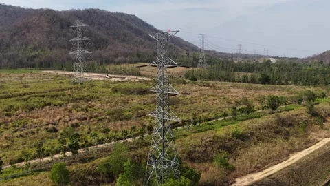 Aerial view of high voltage power lines tower Stock Footage 329091253