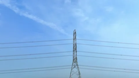 An aerial view of a high-voltage tower. Video stock 306142389