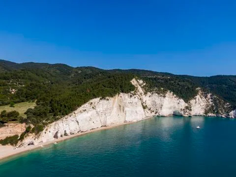 Aerial view of high white cliffs of Vignanotica beach in Apulia region, Italy Stock Photos