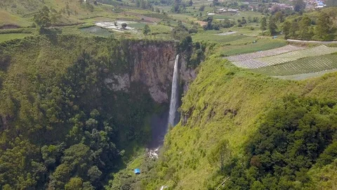 Aerial view of the highest waterfall known as Sipisopiso Waterfall in Indonesia. Stock Footage 104384858