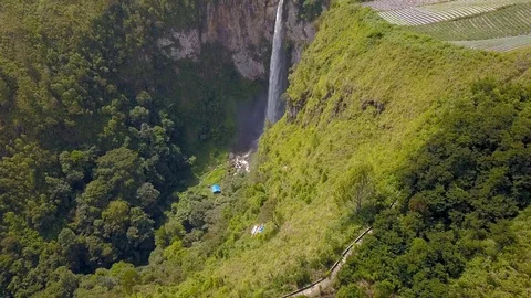 Aerial view of the highest waterfall known as Sipisopiso Waterfall in Indonesia. Stock Footage 104384862